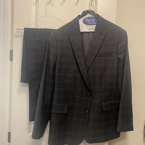 Gray plaid men’s suit jacket and pants
